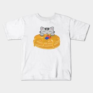 Cute grey cat eating a pancake Kids T-Shirt